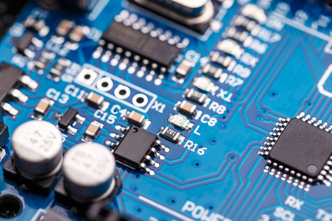 Microprocessor on blue circuit board representative of the high tech industry and computer science
